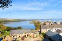 Slapton Ley lies behind the coast, separated by a narrow strip of land that carries the road and South West Coast Path