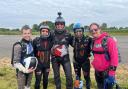 The team completing the british record for skydiving in one day.
