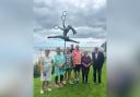 Artist Clare Trenchard, second from left, with town councillors at the unveiling of the Juggler