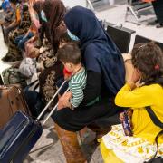 Refugees from Afghanistan arriving on an evacuation flight at Heathrow Airport