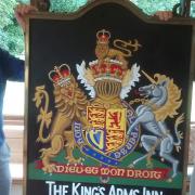 Alan Jackson and John Curnoe, who each repainted one side of the pub sign. Picture: John Vickery