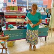 Christine Broom at the Co-op, bringing awareness of unpaid carers to the community