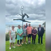 Artist Clare Trenchard, second from left, with town councillors at the unveiling of the Juggler