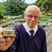 PECO and Pecorama exhibition manager, Andrew Beard with the golden-themed wagon