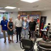 Honiton MP Richard Foord with staff and volunteers at Trip.