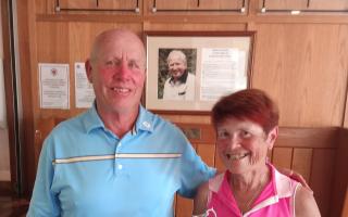 David Smith and Janet Higgins with the claret jug