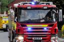 Firefighters battling to get 'large building fire' under control