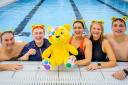 BBC Radio Scotland presenters with Pudsey Bear in the pool at Allander Leisure Centre in Bearsden