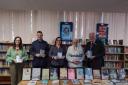 L-R: Julia Edwards, LRC assistant, David Farmer, deputy headteacher, Deborah Stephenson, LRC manager, Garnett Alderson, chaplain, and Neil Morris, headteacher