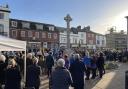 Honiton Remembrance Sunday parade in 2022. Crowds gather.