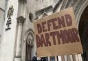 Wild camping campaign placard outside the High Court at the time of the hearing earlier this month