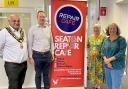 Cllr Amrik Singh, MP Richard Foord and members of Seaton Repair Café.