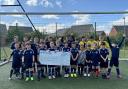 Cranbrook United FC with their cheque