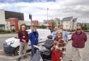 Cranbrook Town Council Councillors, Lesley Browne from LiveWest and Matt Rowett from Move More Cranbrook, celebrate the arrival of the mobility scooter