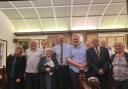 Joshua Denning, fifth from right, is congratulated by members of Lyme Regis Town Council on being awarded the Honorary Freedom of the Town of Lyme Regis.