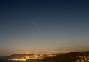 Photo of Comet A3 (Tsuchinshan-Atlas) passing over Lyme Regis on Thursday, October 17.