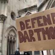 Wild camping campaign placard outside the High Court at the time of the hearing earlier this month