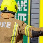 Exeter and Ottery St Mary fire crews tackle an electric car fire in Cranbrook (June 14).