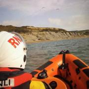 Lyme Regis RNLI deployed on Saturday (July 6) to search for two people cut off by the tide.