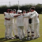 Axminster Town CC celebrate their win