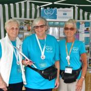 From left: Committee member Stella Ford, volunteer Lorraine Bracey and chairman, Winnie Cameron at the  Gittisham Fete