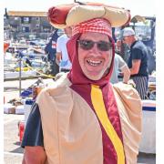 Crew member Dave Holland dressed as a hot dog.