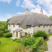 This picture-postcard country house sits on a large 3/4 acre plot on the edge of Axminster  Pictures: Stags