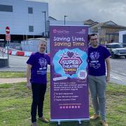 Andy Keeble and Tom Darby Clark from the Royal Devon Hospitals Charity in front of where the new theatre will be.