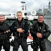 Three Devon police officers who boarded a boat in dangerous conditions to restrain a man who was threatening to set himself alight have won Defence Police Federation Bravery Awards.