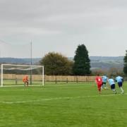 Taylor Rooke scores Beer's penalty kick in the game against Plymouth Marjon