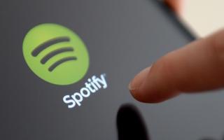 Spotify's Playlist in a Bottle feature allows you to create a playlist that will be locked until January 2025